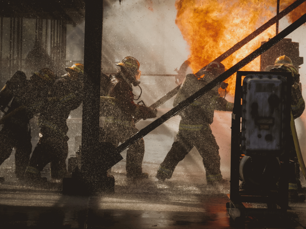 Industrial firefighters in a live training